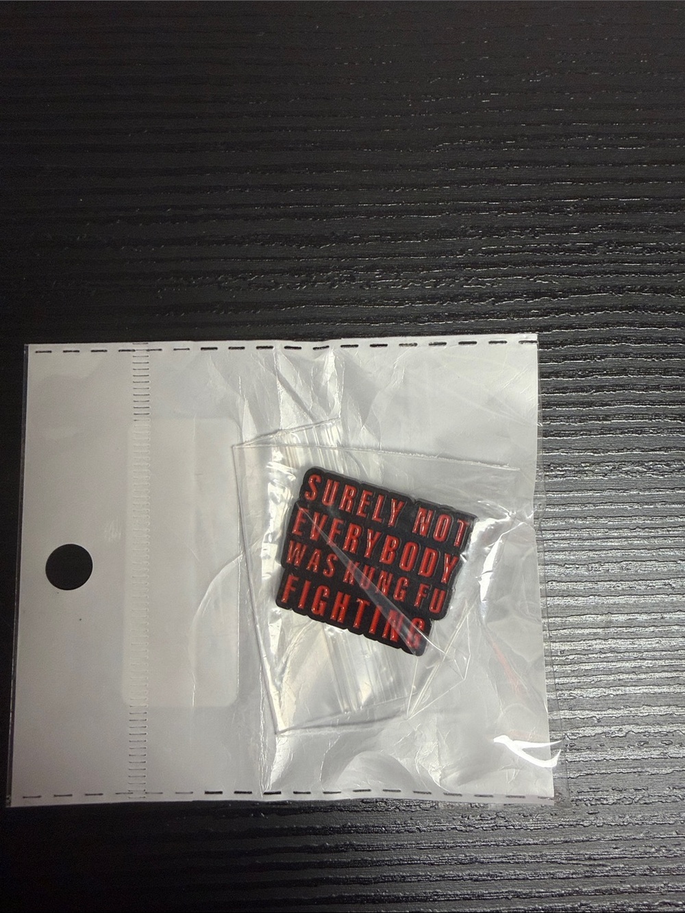 Black & Red Enamel Pin Accessory - “surely not everybody was kung fu fighting”